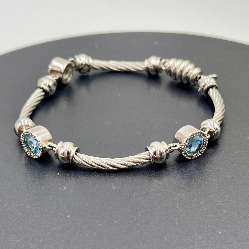Designer Signed Sterling Silver
Steel Twisted Cable Blue Topaz Diamond Bracelet